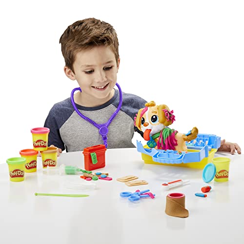 Play-Doh Care 'n Carry Vet Playset for Kids 3 and Up with Toy Dog, Storage, 10 Tools, and 5 Modeling Compound Colors.