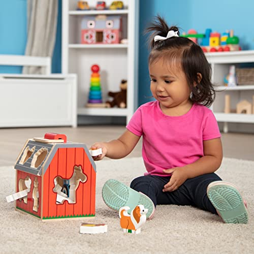 Melissa & Doug Wooden Take-Along Sorting Barn Toy with Flip-Up Roof and Handle, 10 Wooden Farm Play Pieces - Ages 2+