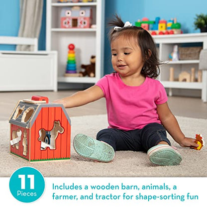 Melissa & Doug Wooden Take-Along Sorting Barn Toy with Flip-Up Roof and Handle, 10 Wooden Farm Play Pieces - Ages 2+